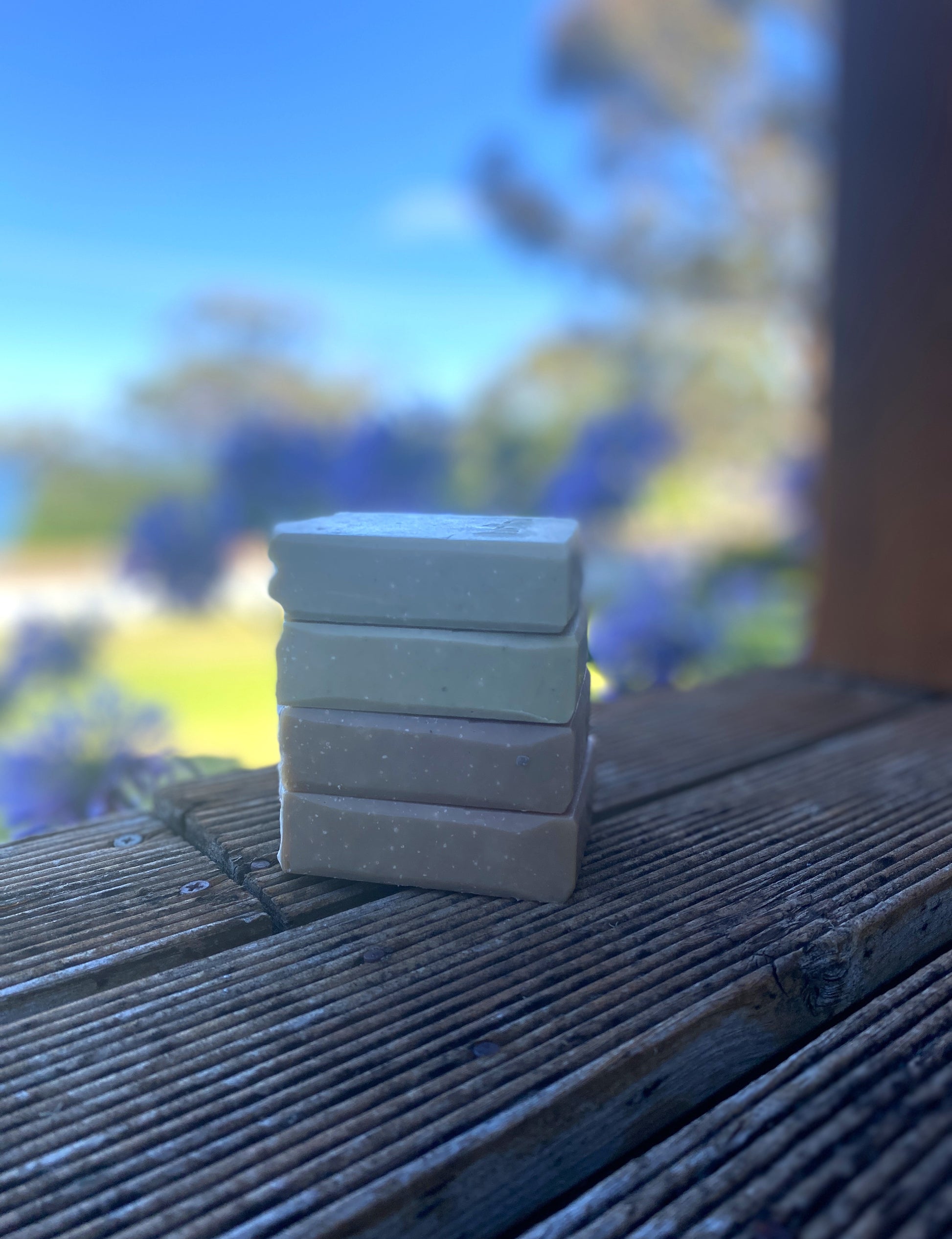A collection of 4 handmade soap bars.