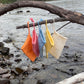 A collection of sisal soap bags in various colours.