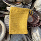 Yellow 100% sisal soap bag. Throw in your Luminus soap bits rather than waste.
